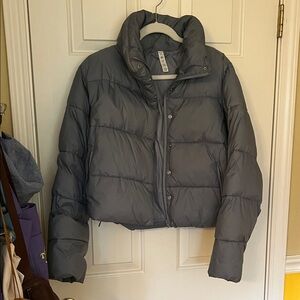 ALO Yoga Women's Puffer Jacket - Light blue/grey color